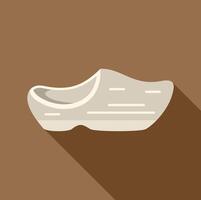 White clog shoe casting long shadow on brown background vector