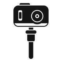 Digital camera recording video using monopod icon vector