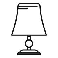 Elegant desk lamp standing on a table providing light vector