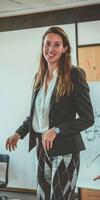 Smiling Businesswoman In A Modern Office Setting photo