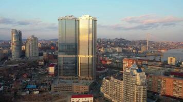 Drone view of a modern skyscraper located in the center of Vladivostok video