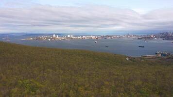 Panoramic aerial view of the strait and the bridge at dawn video