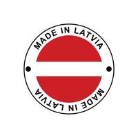 MADE IN Latvia circle stamp with flag vector