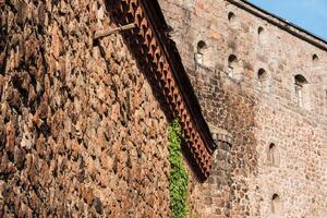 vintage architectural background, fragment of walls of an old castle photo