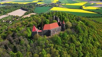 Old fortress surrounded by green forest, aerial view. Grodziec Castle, Poland video