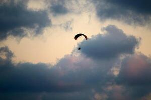 Flying on a wing over the Mediterranean Sea photo