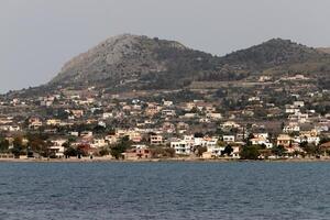 View from the deck of a steamship on a small island in the Aegean Sea. photo