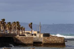 Akko Israel 05.26.1924. Ancient city - port on the shores of the Mediterranean Sea photo