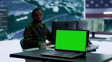 US army working in a top secret control center with isolated mockup screen, ensuring national safety while studying surveillance footage from radar cctv. Command service. Camera A. video