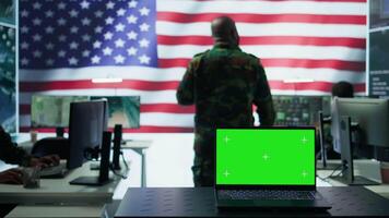 US army working in a top secret control center with isolated mockup screen, ensuring national safety while studying surveillance footage from radar cctv. Command service. Camera B. video