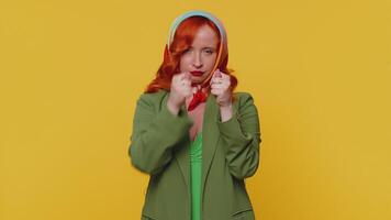 Greedy avaricious redhead young woman showing fig negative gesture, rapacious avaricious acquisitive video