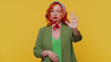 Girl say No, hold palm folded crossed hands in stop gesture, warning of finish, prohibited access video