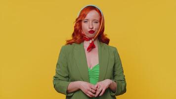 Funny ginger girl making playful silly facial expressions, grimacing, fooling around showing tongue video
