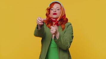 Mime young woman pulling an imaginary unreal invisible rope showing how enduring, strong she is video