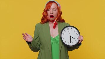 Redhead woman with anxiety checking time on clock, running late to work, being in delay, deadline video