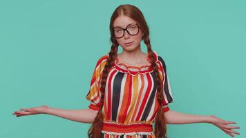 Confused redhead girl feeling embarrassed about ambiguous question, having doubts, no idea, clueless video