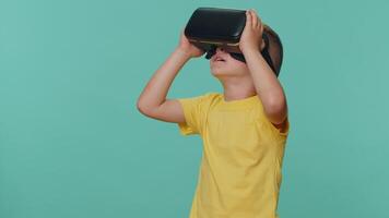 Little toddler children boy using VR headset helmet app to play simulation virtual reality game video