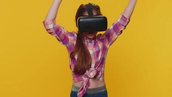 Child girl kid using virtual reality VR app headset to play simulation 3D game watching video