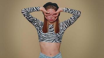 Funny woman making playful silly facial expressions and grimacing, fooling around, showing tongue video