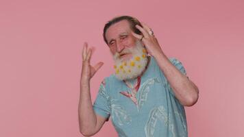 Funny joyful man making playful silly facial expressions, grimacing, fooling around showing tongue video