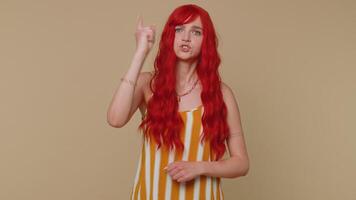 Displeased girl gesturing hands with irritation, displeasure blaming scolding for failure asking why video