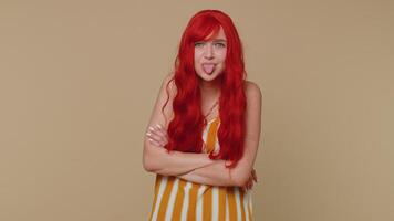 Funny woman showing tongue making faces at camera, fooling around, joking, aping with silly face video