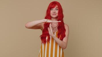 Tired serious upset girl showing time out gesture limit stop break sign no pressure I need more time video