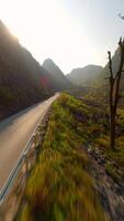 Dynamic FPV Flight Over Scenic Mountain Road on the Ha Giang Loop North Vietnam video