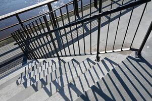 a railing on a stairway photo
