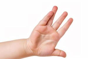 Child's Hand Raised Against White Background. photo