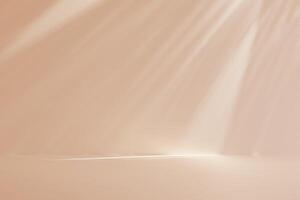 A light shining on a tan wall. The light is coming from the top left corner and is casting a shadow on the wall. photo