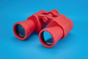 These vibrant binoculars embody the watchful spirit of lifeguarding, poised to survey the azure horizon for any signs of activity. photo