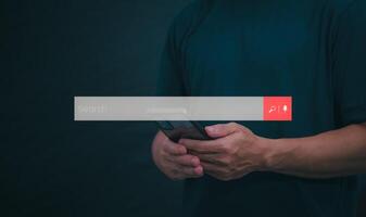 Information search technology, search engine optimization, male hand using a smartphone to search information, using the search bar function on your website photo