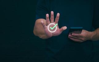 Person showing protection system In order to screen or prevent attacks from cyber, hackers, the concept of managing systems to be safe. digital transformation Internet of Things, Data Storage photo