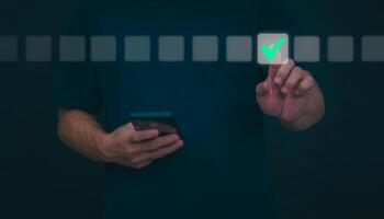 Businessmen mark check blocks to verify the correctness and approve or accept the agreement. in digital documents Concept of working via the internet photo