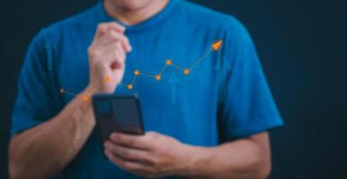 Planning and strategy, stock market, business growth, progress or success concept, businessman or trader showing growing virtual holographic stocks, invest in stock market trading or digital assets photo