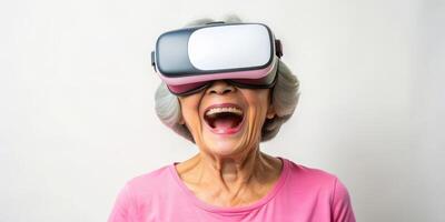 Senior Asian woman experiencing virtual reality with joyful expression photo
