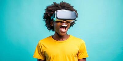 Teenager black boy experiencing virtual reality with joyful expression photo