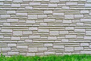 Gray brick wall. Dark abstract background. Building brick construction. photo