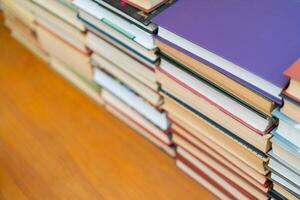 Rows of books in the library. Background for text. Symbol of knowledge and learning. photo