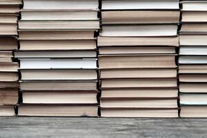 Rows of books in the library. Background for text. Symbol of knowledge and learning. photo