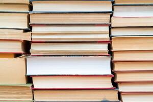 Rows of books in the library. Background for text. Symbol of knowledge and learning. photo
