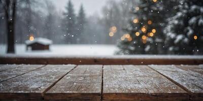 Top desktop wooden Empty table and winter snow background with beautiful bokeh. photo