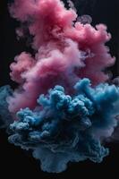 A cloud of smoke fills the frame, with pink and blue colors blending together The background is a black surface. photo
