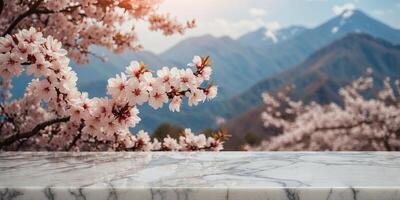 White marble stone table with Sakura on blur bokeh background For display or montage you products. photo