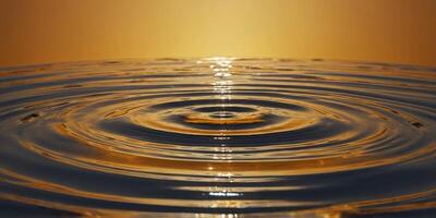 A yellow-orange gradient background with a circular water ripple in the middle The entire picture is presented from above at eye level with a minimalist composition. photo