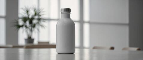 A sleek and distinctive white canteen mockup bottle presented on a minimalistic white surface. photo