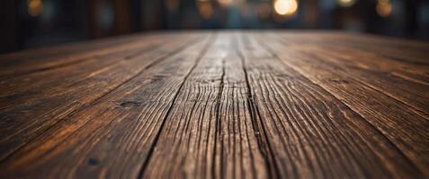 An empty brown wooden table with a blur background. photo