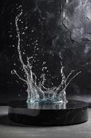 Black stone podium with water splashes Mock up for product presentation Pedestal or platform for beauty products Empty scene Stage, display, showcase Podium with copy space. photo