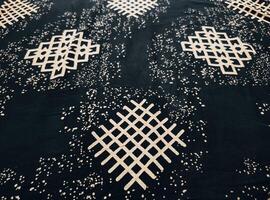 texture, pattern and background of fabric with a geometric box pattern photo